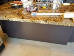painted wall under granite counter top