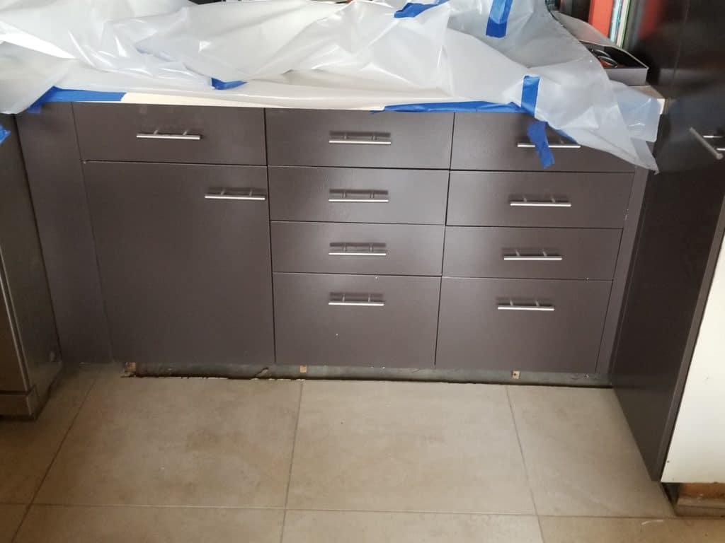 Old cabinets that looks brand new after our crew sanded, painted and finished the whole process